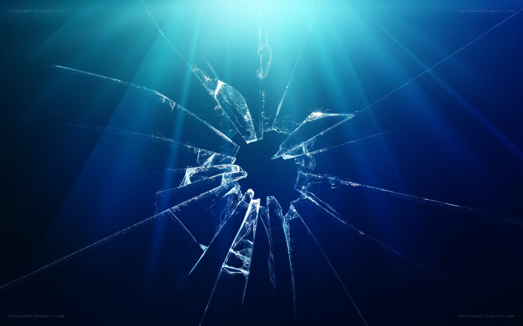 shattered glass with light rays