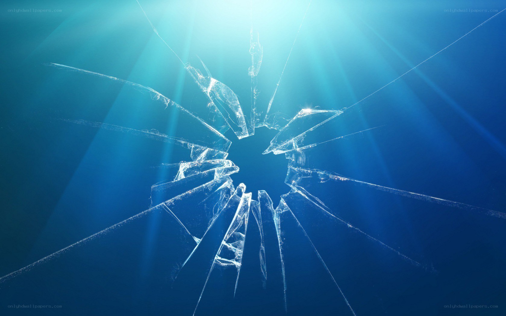shattered glass with light rays