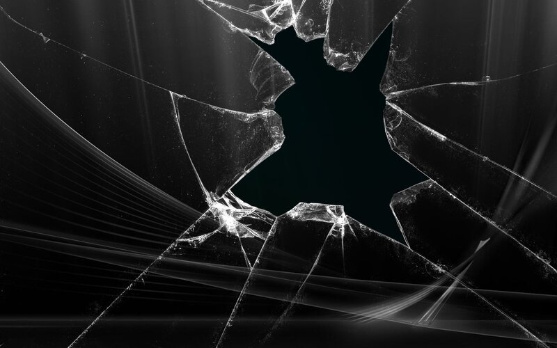 shattered glass with star-shaped hole