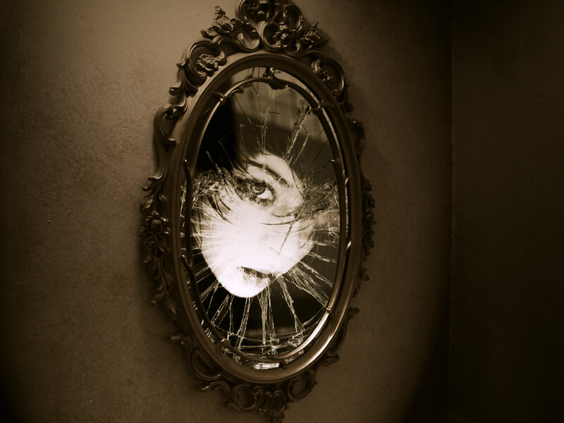 shattered mirror reflection