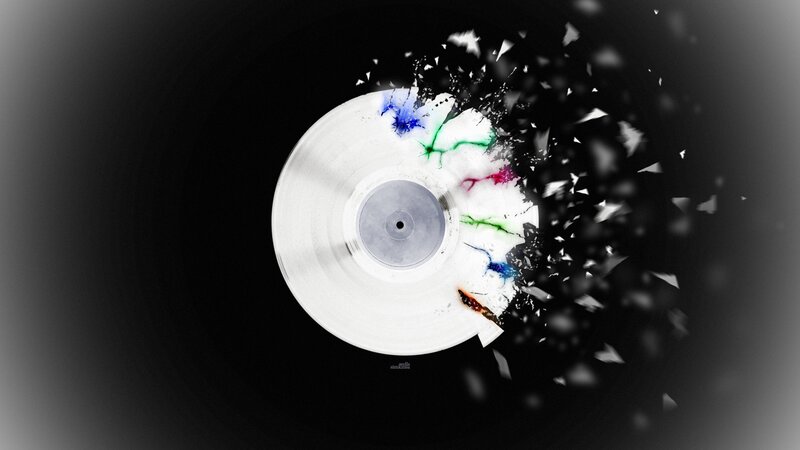 shattered vinyl record with paint