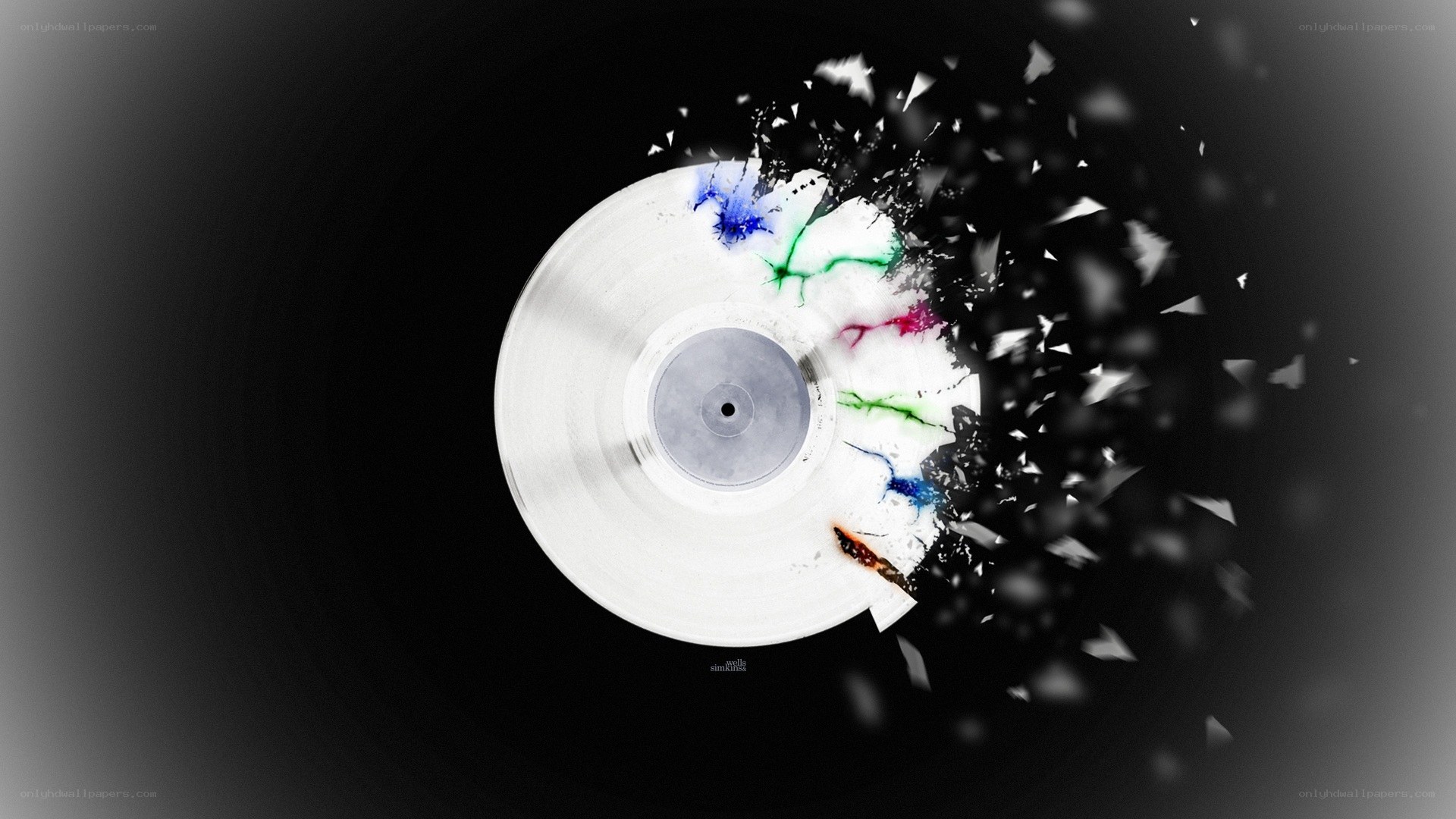 shattered vinyl record with paint