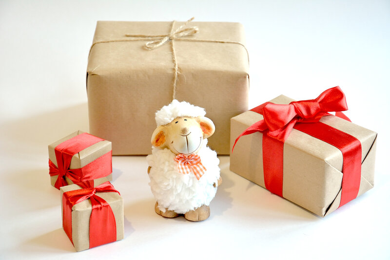 Sheep Figurine with Gifts