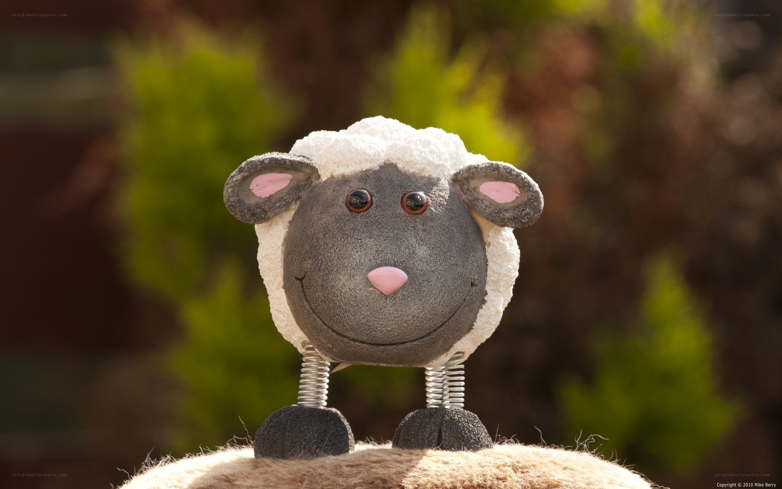 sheep figurine with spring legs