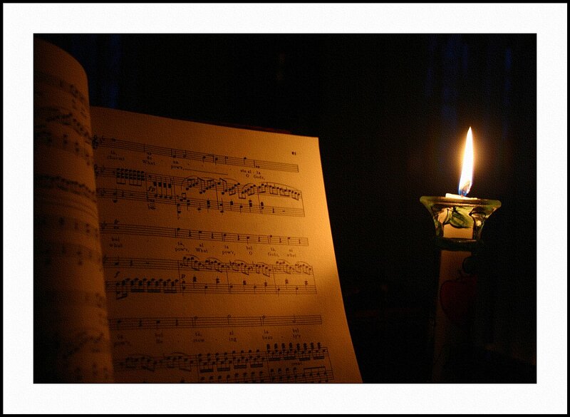 Sheet Music and Candle