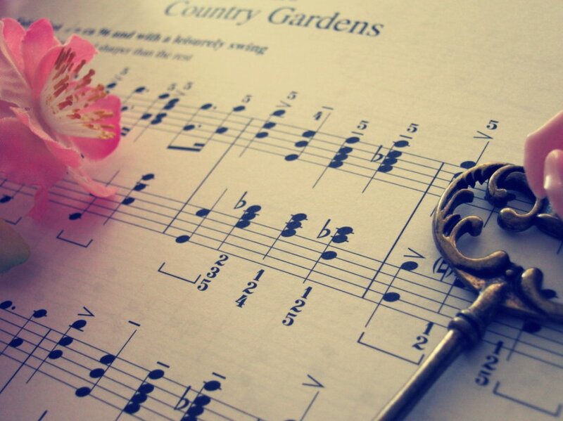 Sheet Music with Key and Flower