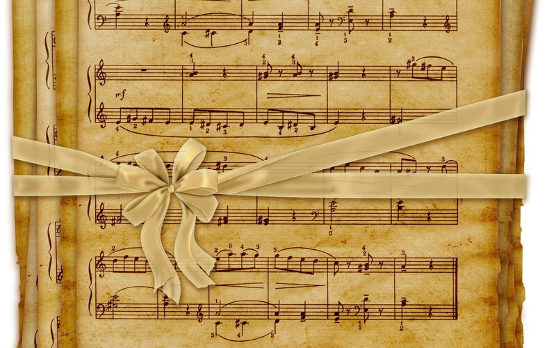 sheet music with ribbon bow