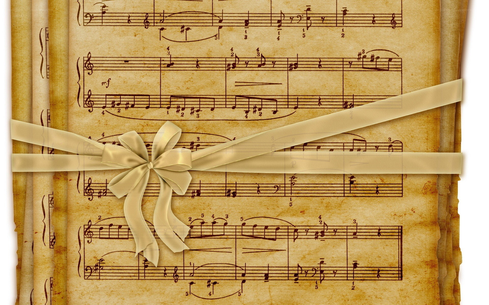 sheet music with ribbon bow