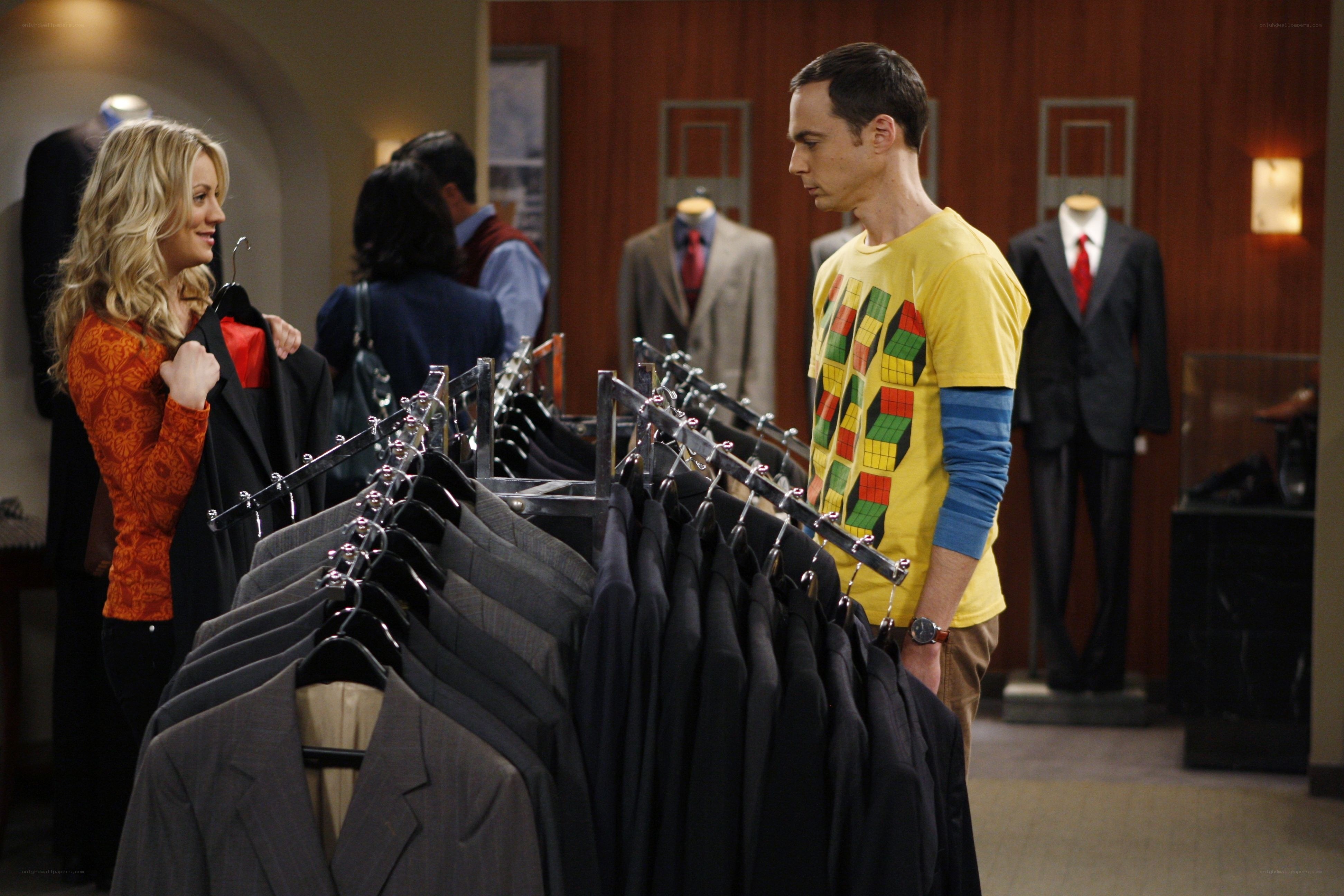 Sheldon and Penny in a suit store