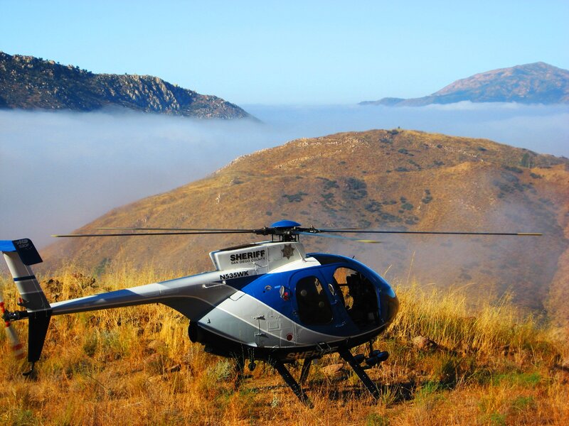 Sheriff helicopter on a hill
