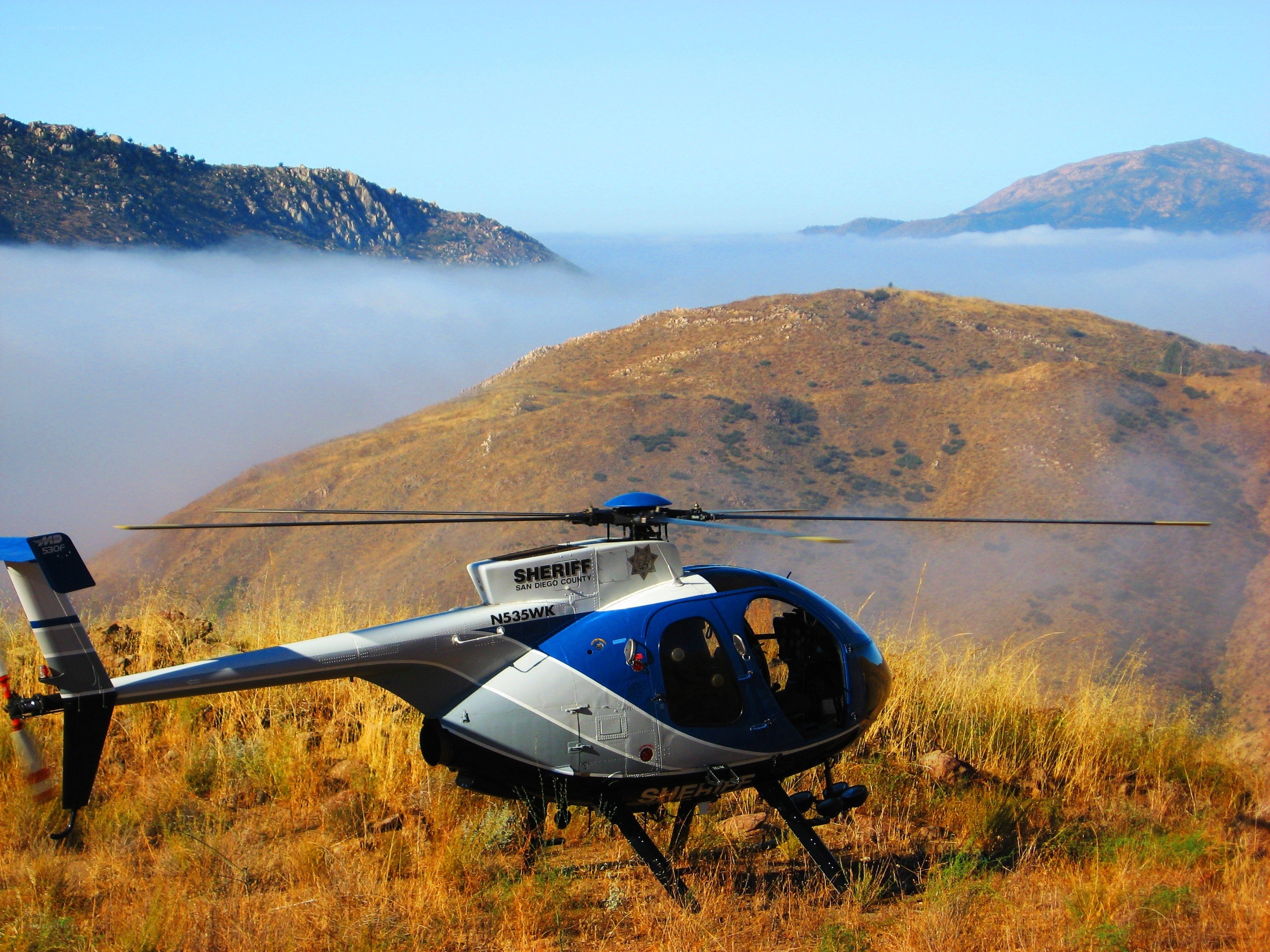 Sheriff helicopter on a hill