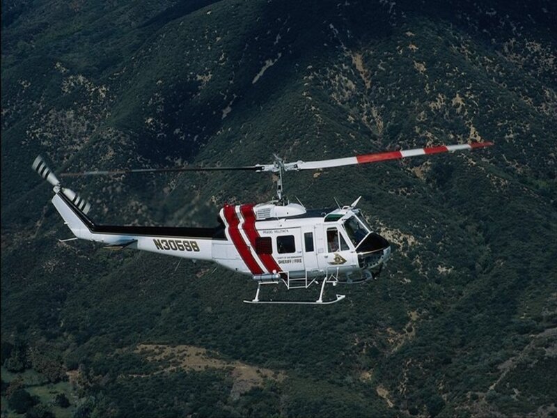 sheriff helicopter over mountains