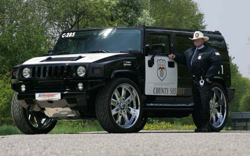 Sheriff Standing with Hummer
