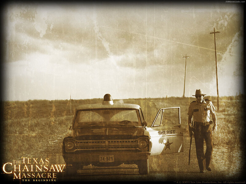 Sheriff Walking Beside Car