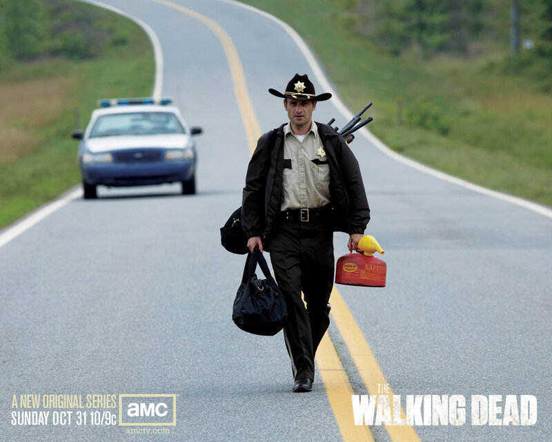 Sheriff walking on road with gear