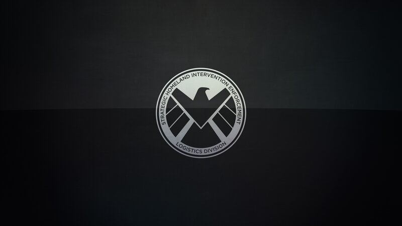 SHIELD Logo on Dark Background — Black