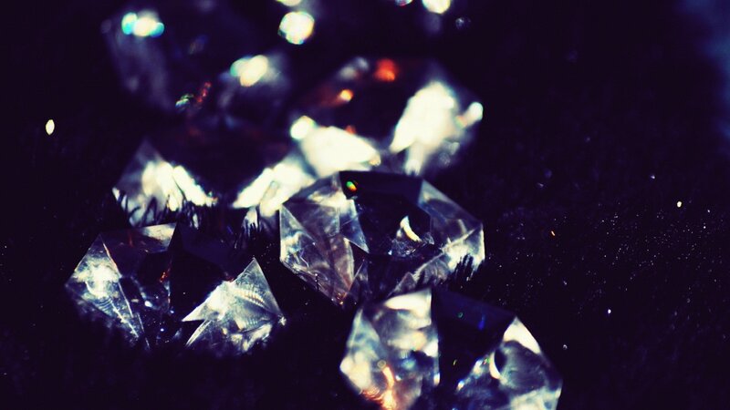 Shimmering crystals on dark background