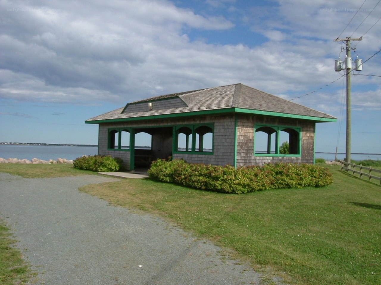 Shingled pavilion by the water