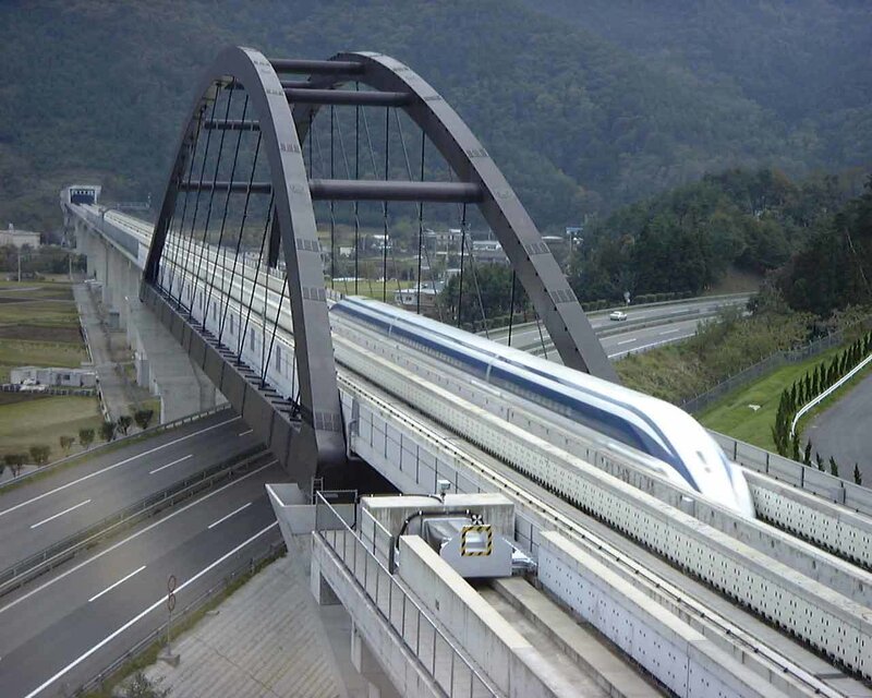 Shinkansen train on arched bridge