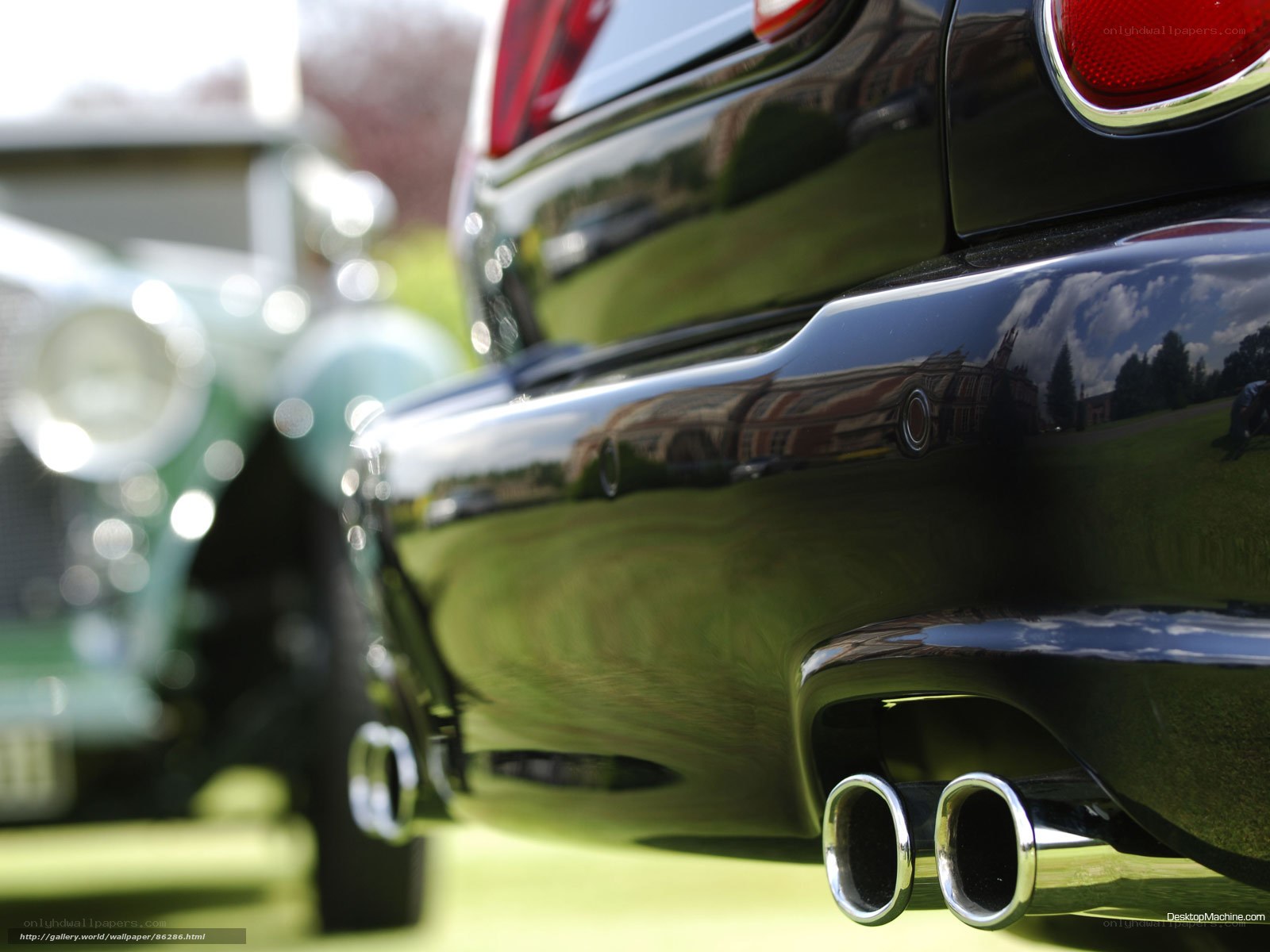 shiny black car exhaust