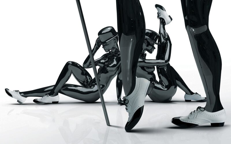Shiny black mannequins with white shoes