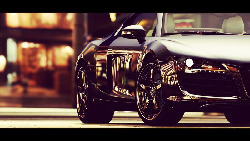 shiny black sports car at night