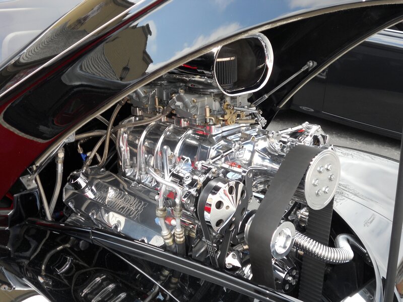 shiny car engine under hood