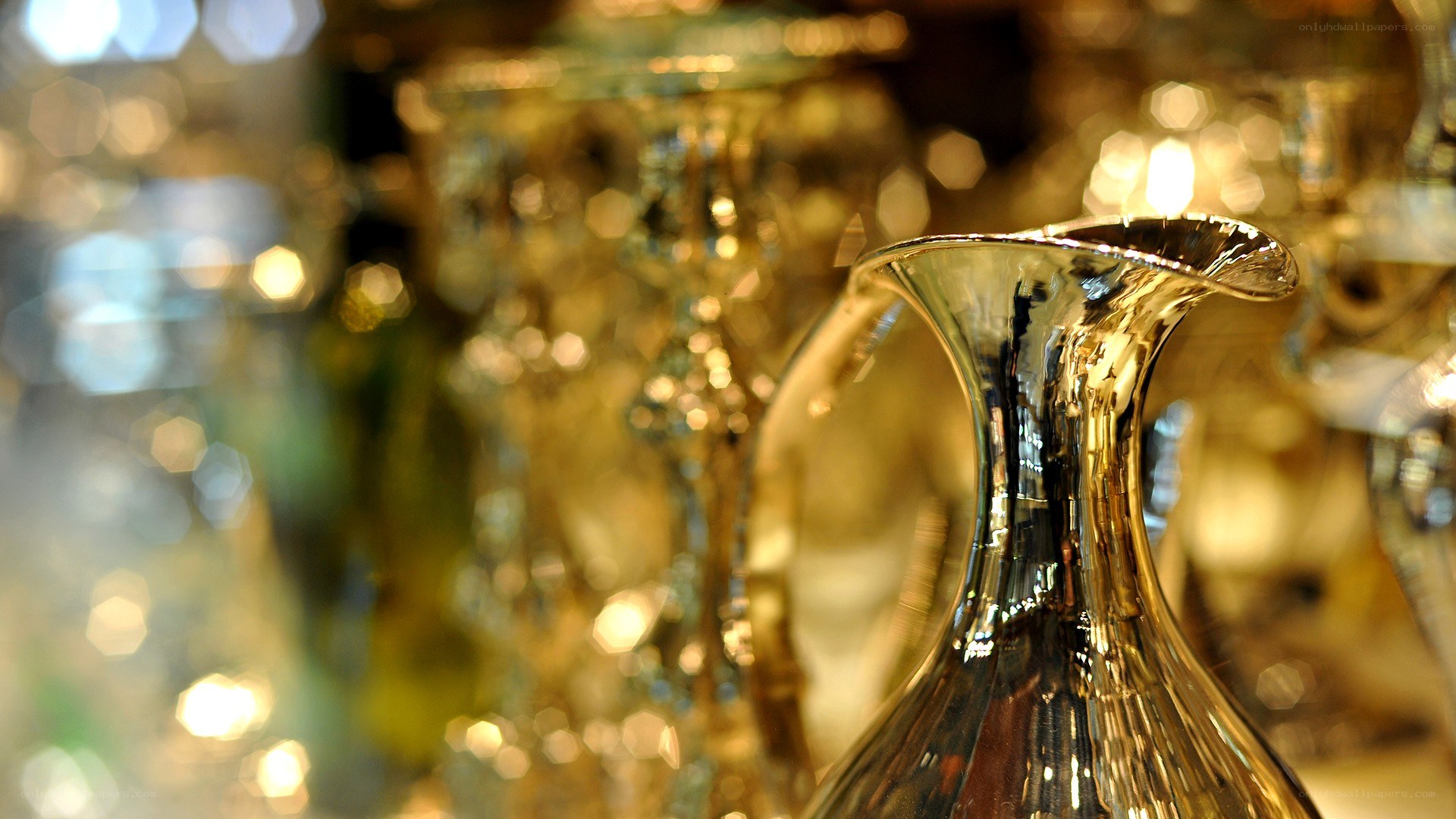 shiny glass pitcher in focus