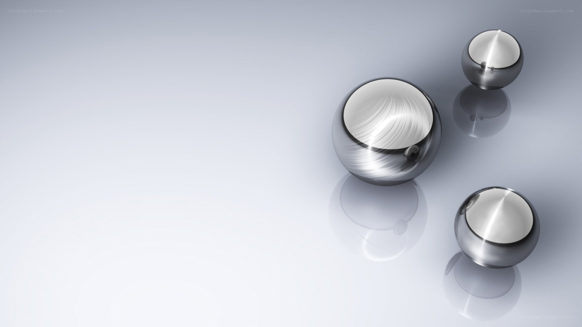 Shiny metallic spheres on reflective surface