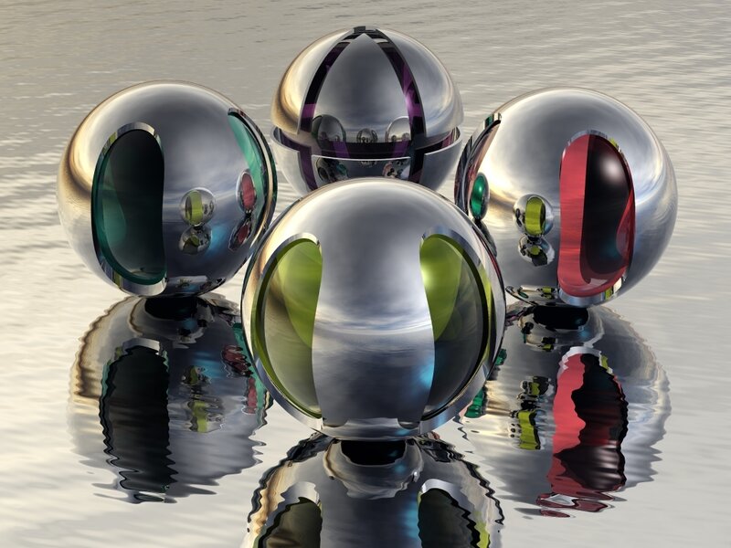 Shiny metallic spheres on water
