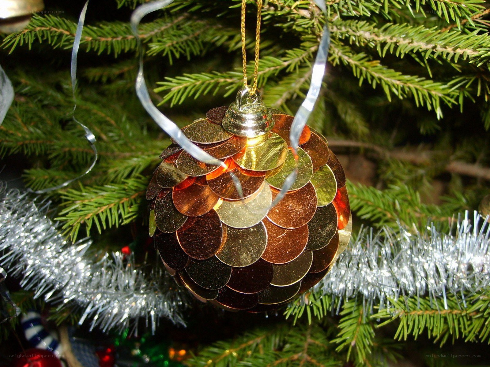 Shiny ornament on Christmas tree