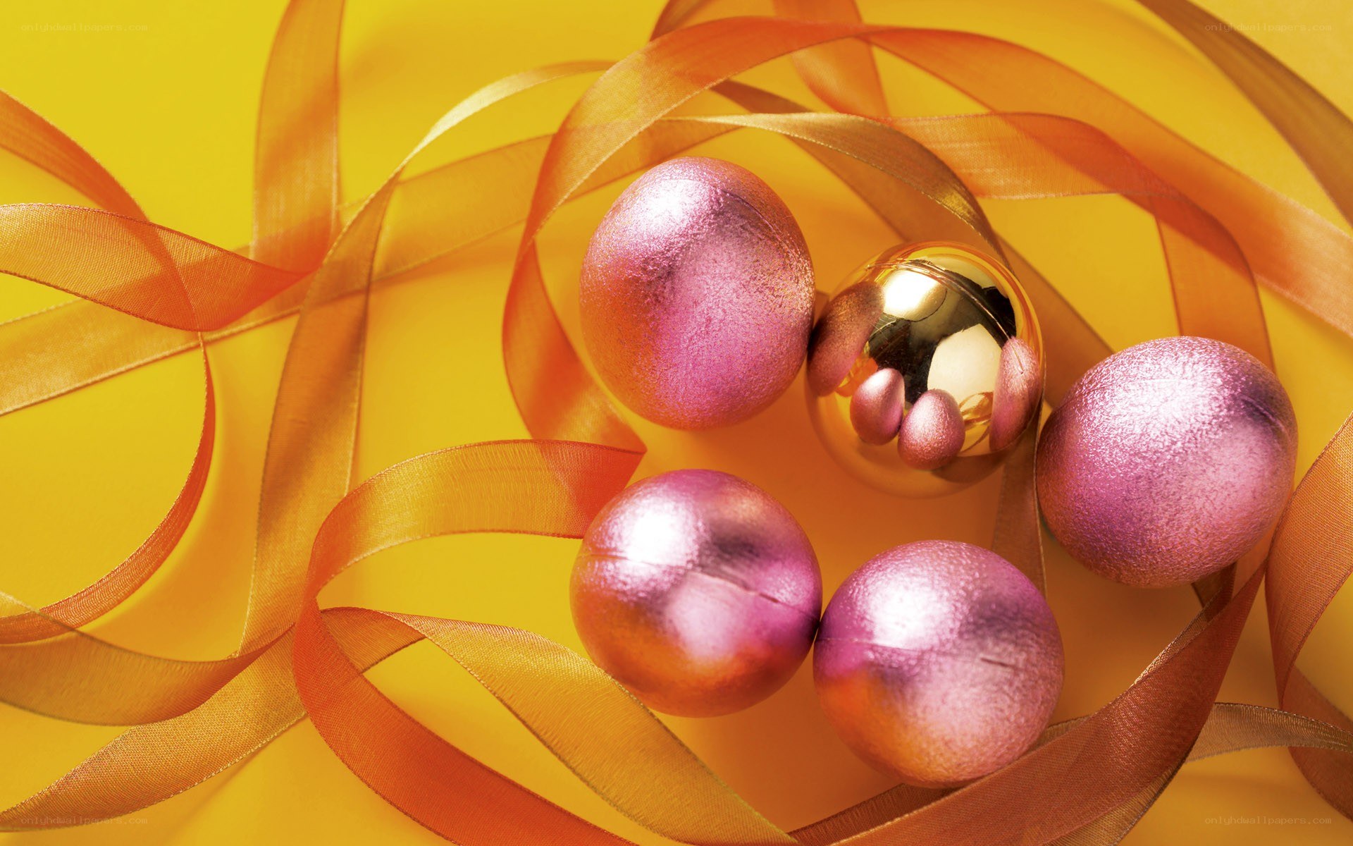 shiny ornaments with ribbons