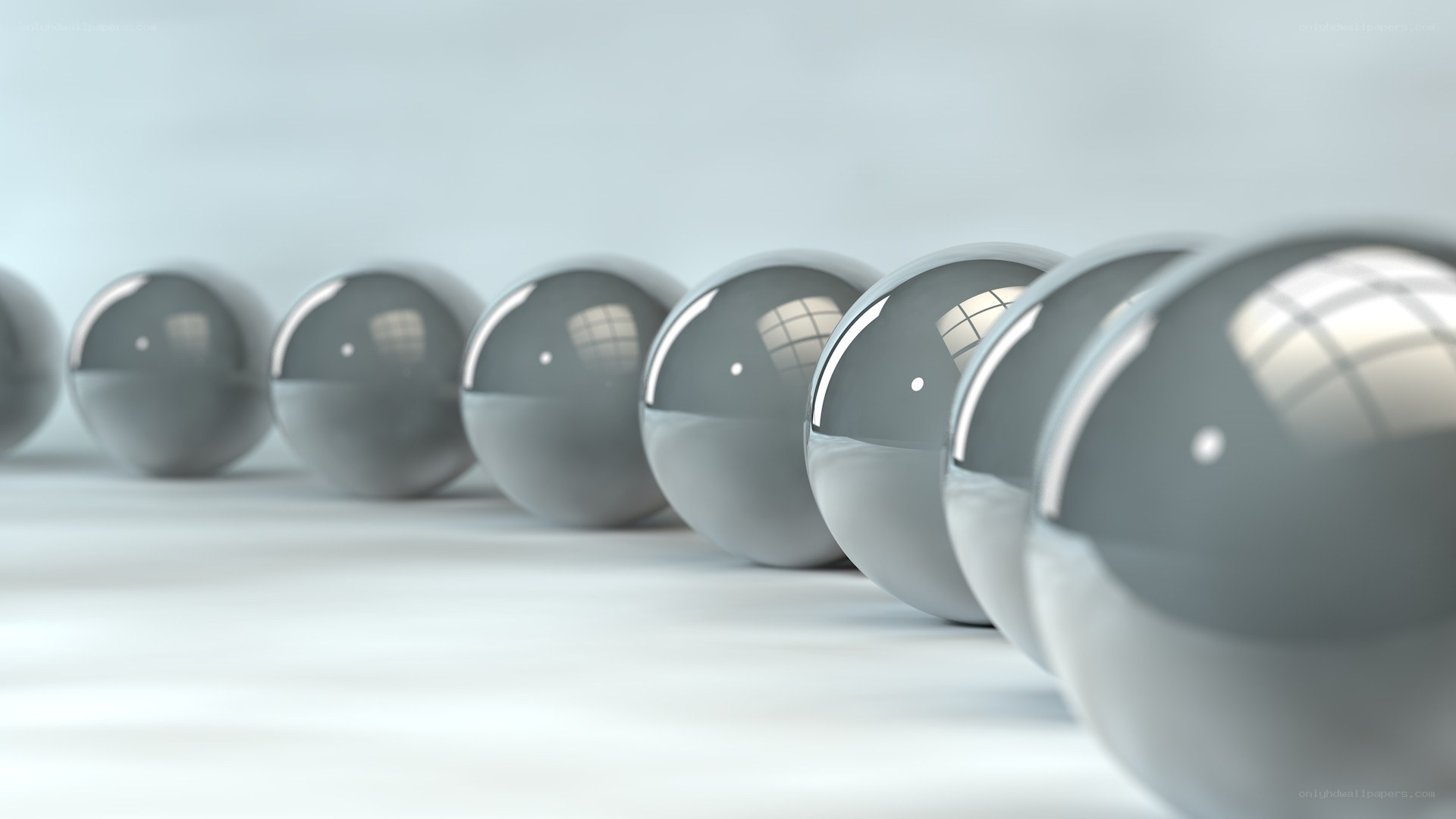 shiny spheres in a row