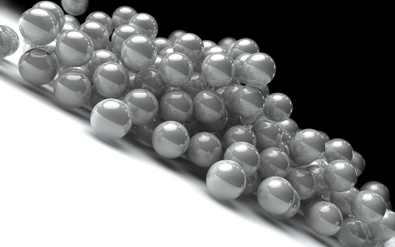 shiny spheres on white surface