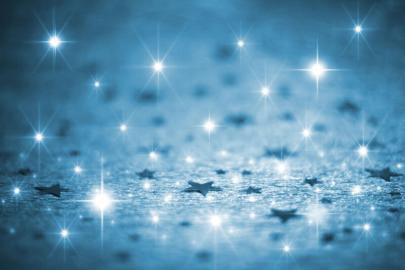 Shiny Stars on Blue Surface