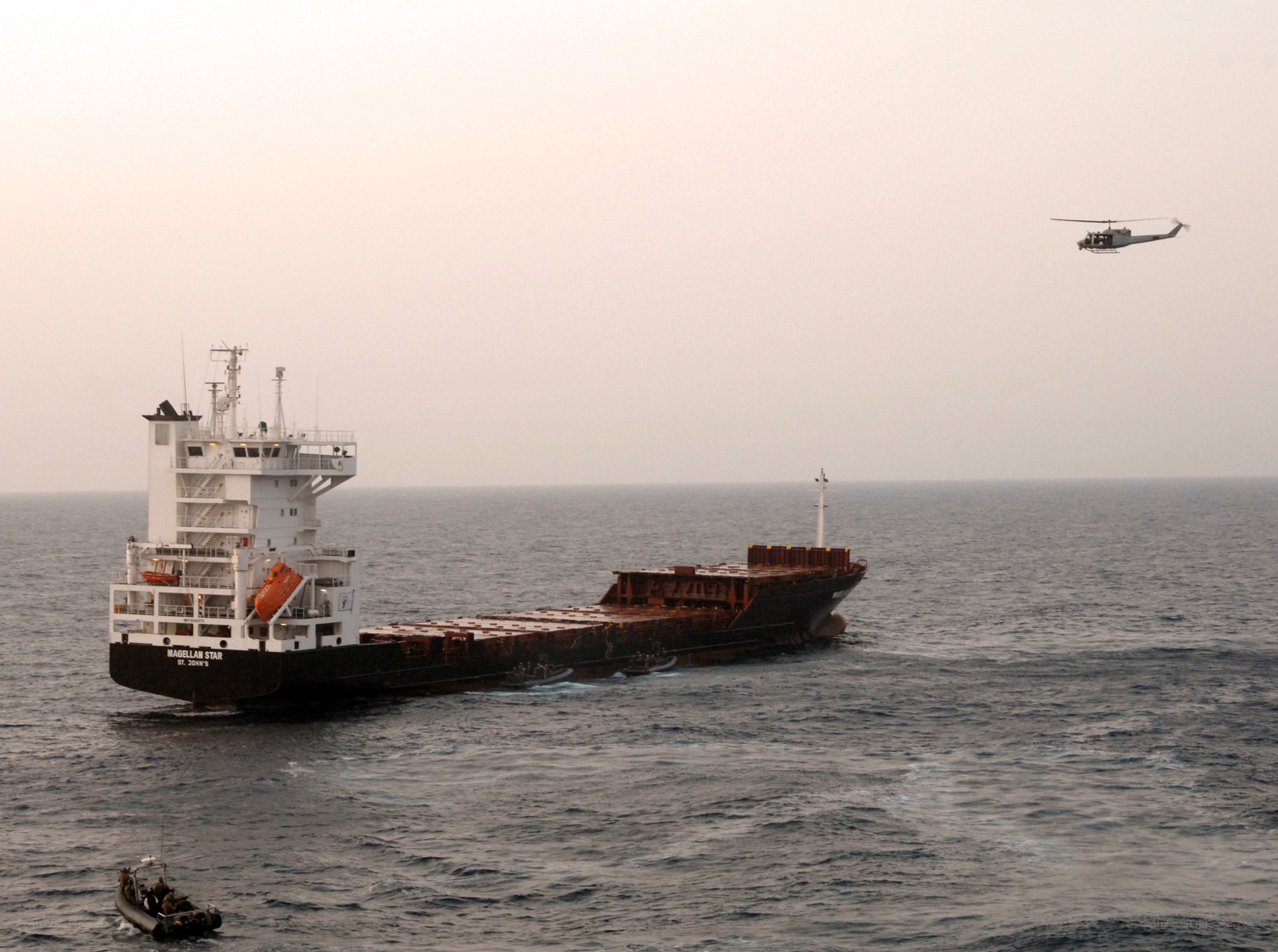 Ship and helicopter at sea
