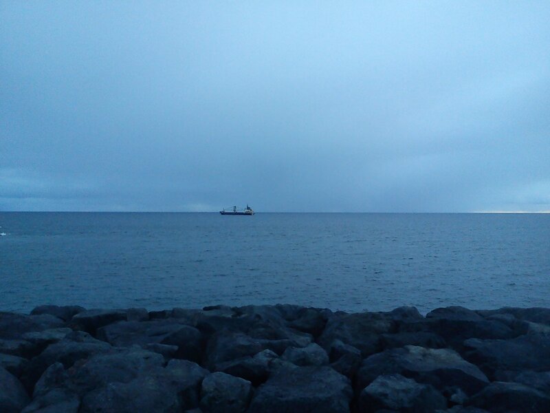 ship at sea during twilight