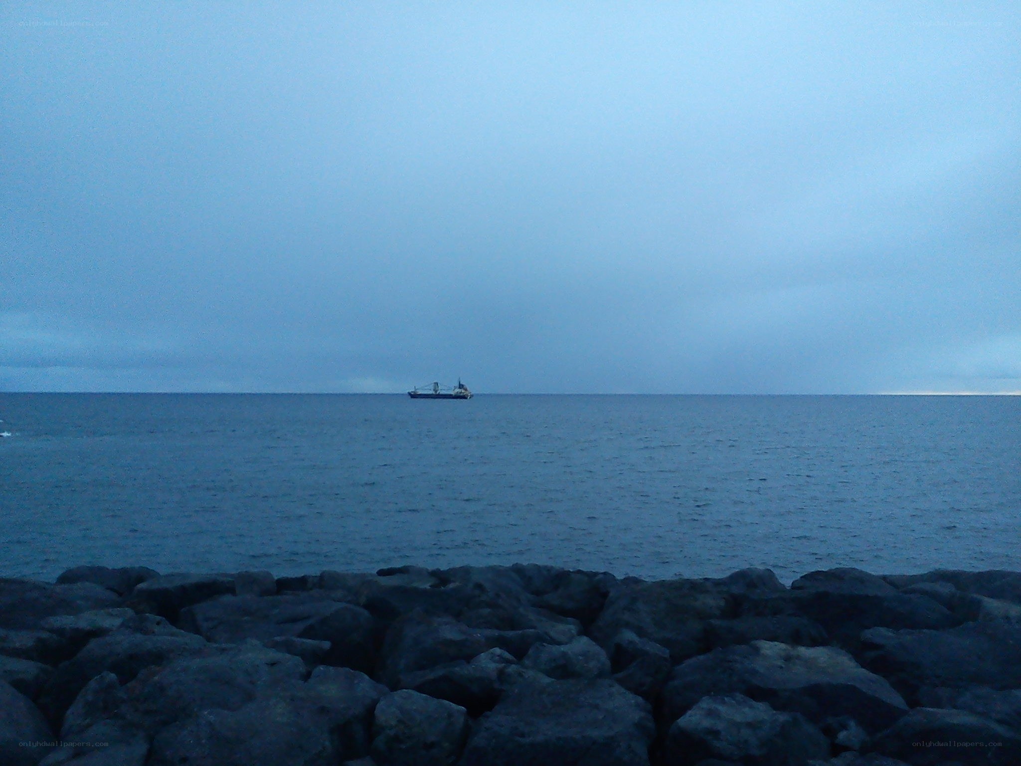 ship at sea during twilight