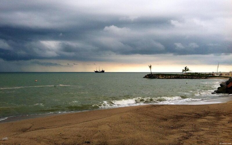 Ship at Sea Near Beach