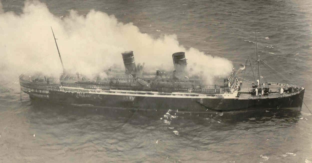 ship at sea with smoke