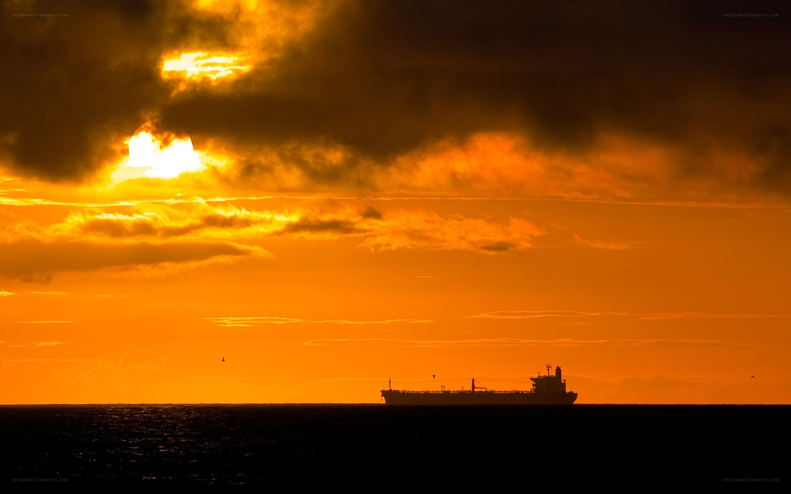 ship at sunset on the ocean