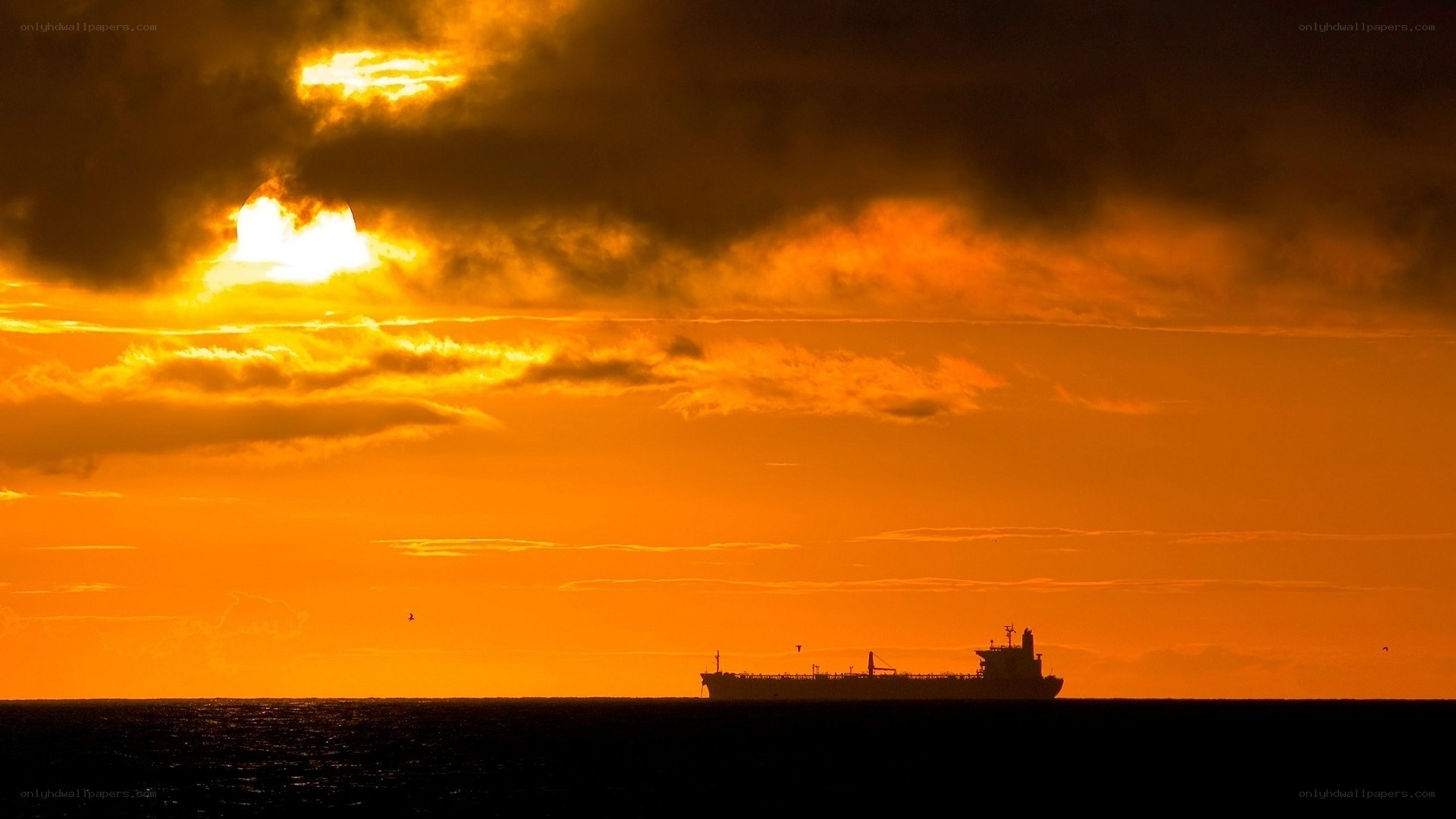 ship at sunset on the ocean