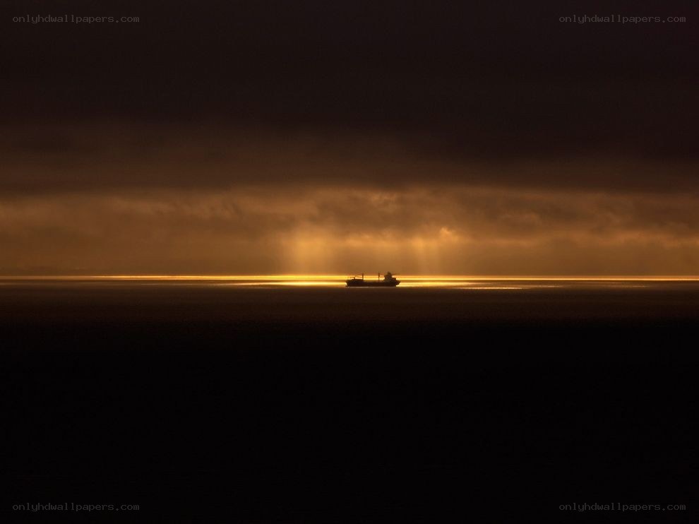 Ship at sunset on the ocean