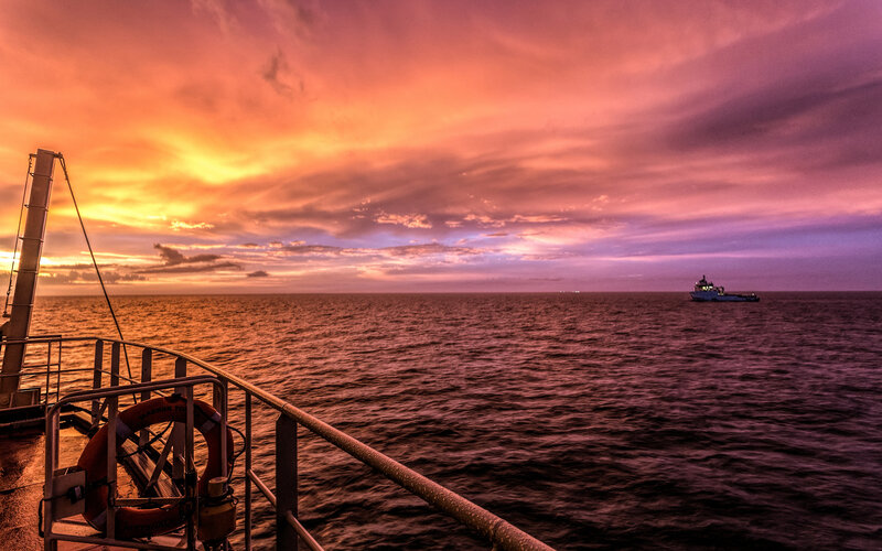 Ship at Sunset — Orange, Dramatic, Photograph