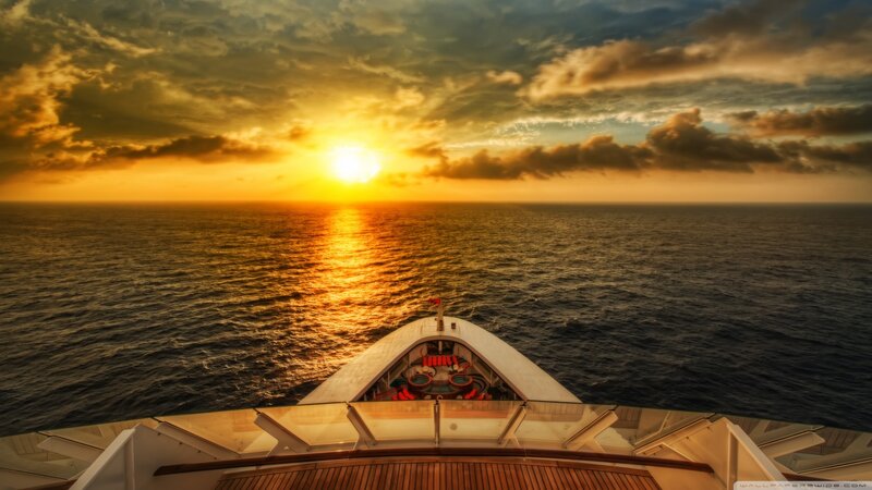 Ship Bow at Sunset — Gold, Dramatic