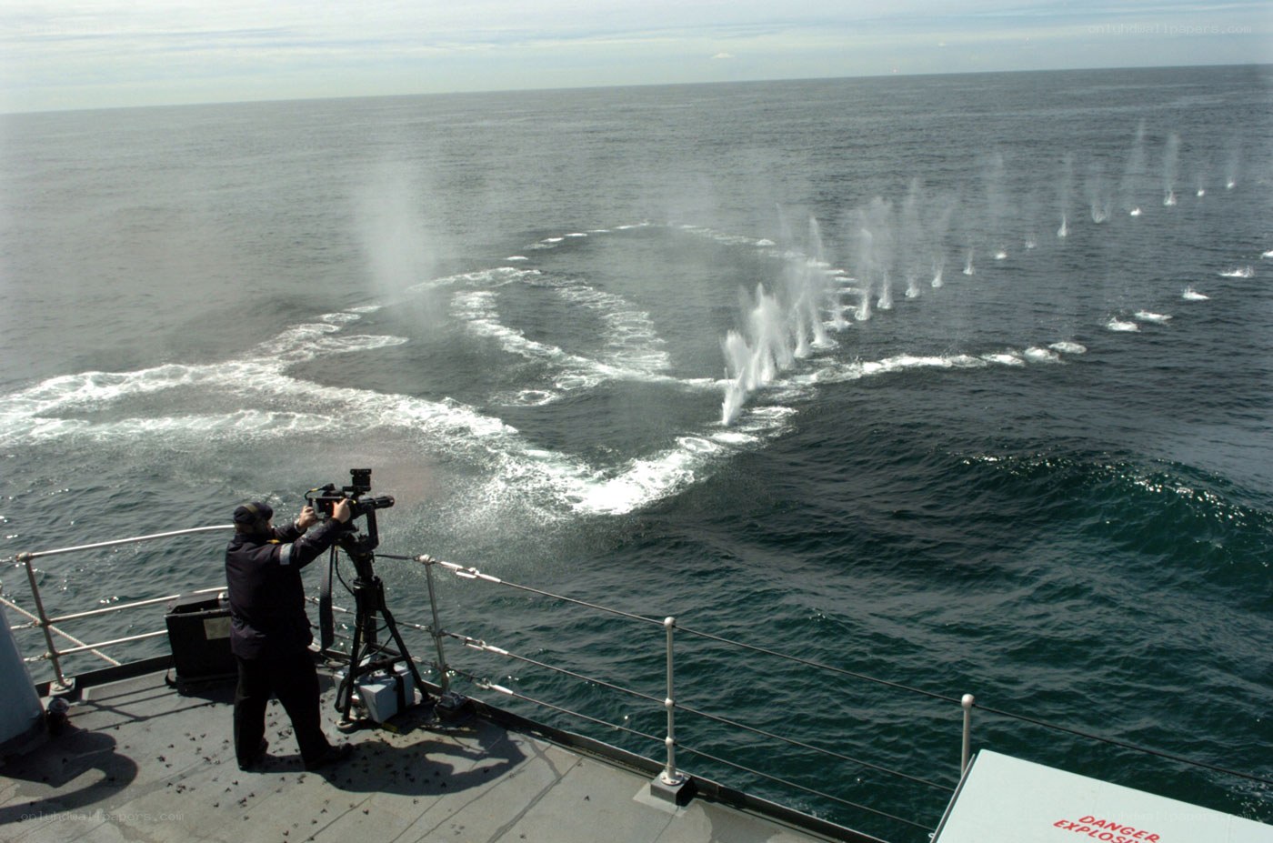 ship firing water cannons