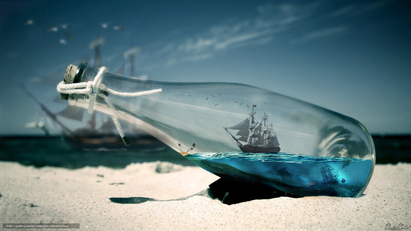 ship in a bottle on beach