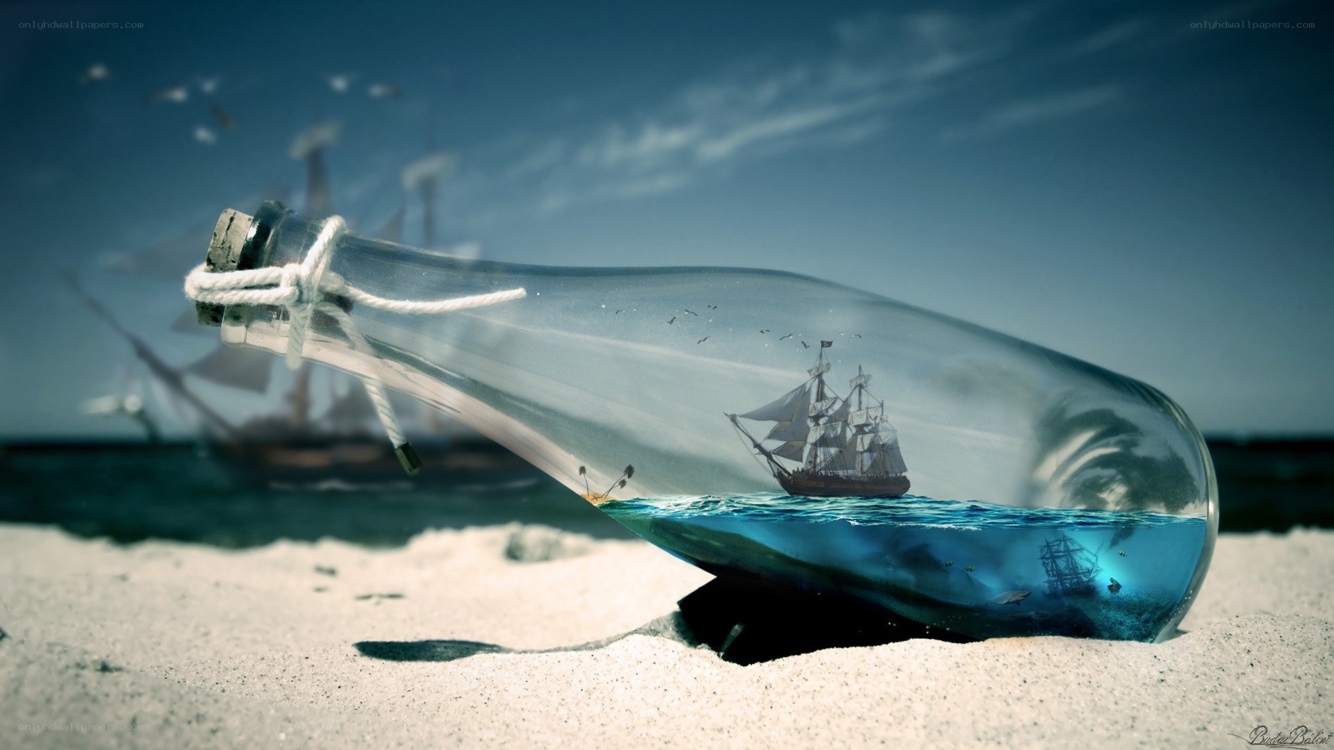 ship in a bottle on beach