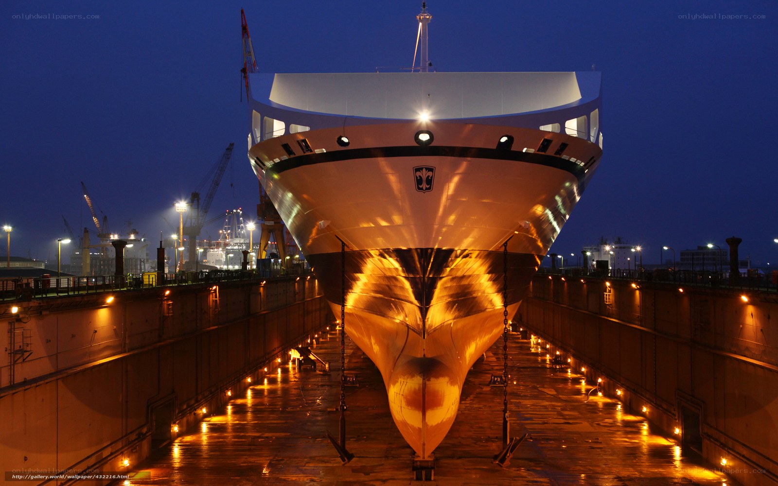 Ship in dry dock at night