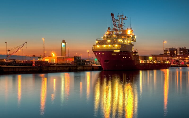 Ship in Harbor at Dusk — Blue, Serene, Sunset